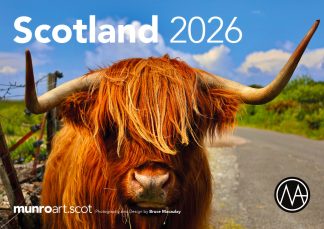 Cover of MunroArt 2026 Scotland Calendar with a highland cow photographed in Mull